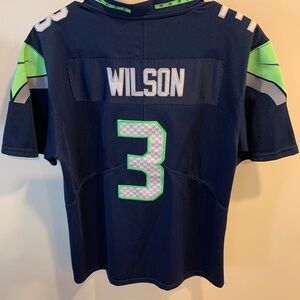 Russell Wilson women’s Seattle Seahawks jersey. Like new. Size XL. Runs smaller